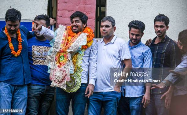 Candidate Abhi Dhaiya celebrating after winning the posts in the Delhi University Students Union elections, at Delhi University north campus on...