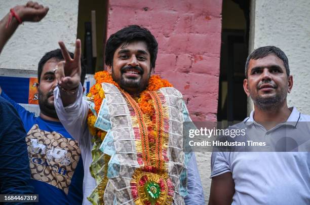 Candidate Abhi Dhaiya celebrating after winning the posts in the Delhi University Students Union elections, at Delhi University north campus on...