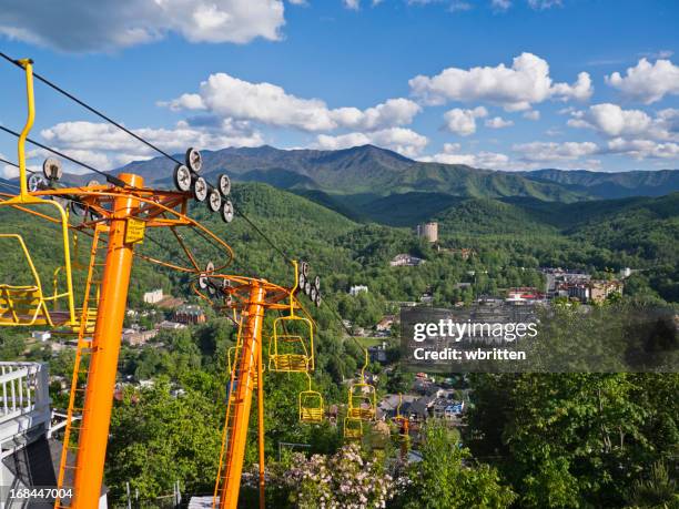 ski lift overlooking the smoky mountains and gatlinburg - gatlinburg tennessee stock pictures, royalty-free photos & images