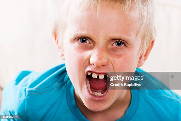 Child Rude Face Kid Mean Face Photos and Premium High Res Pictures - Getty Images
