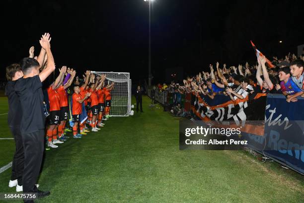 Brisbane Roar celebrate with fans during the Australia Cup 2023 Quarter Final match between Brisbane Roar and Western Sydney Wanderers at Perry Park,...