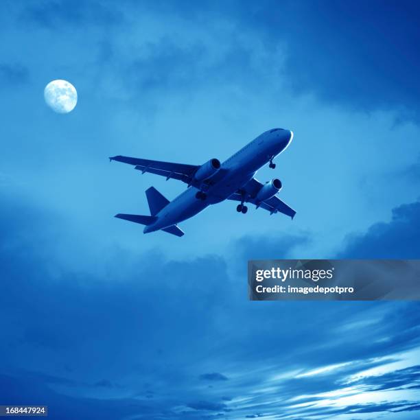 airplane - moon sky and plane stock pictures, royalty-free photos & images
