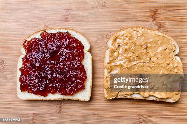 open face peanut butter and jelly sandwich - sliced white bread isolated stock pictures, royalty-free photos & images