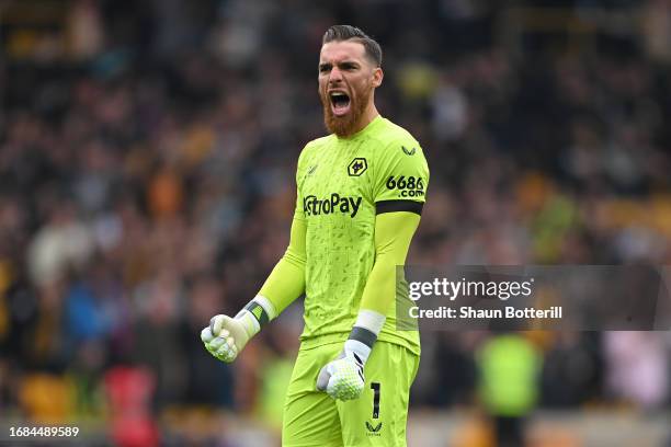 Jose Sa of Wolverhampton Wanderers celebrates after Hwang Hee-Chan of Wolverhampton Wanderers scores their sides first goal during the Premier League...