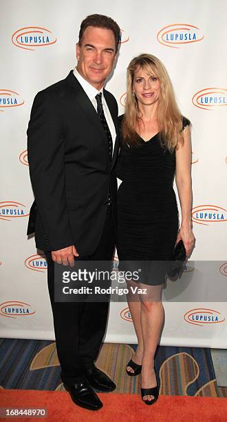 Actor and Loop Award presenter Patrick Warburton and his wife Cathy Jennings arrive at the 13th Annual Lupus LA Orange Ball at the Beverly Wilshire...