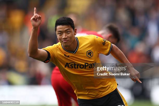 Hwang Hee-Chan of Wolverhampton Wanderers celebrates after scoring their sides first goal during the Premier League match between Wolverhampton...