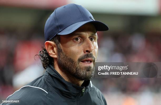 Lyon's French head coach Fabio Grosso looks on during the French L1 football match between Brest and Lyon at the Francis Le Ble stadium in Brest,...