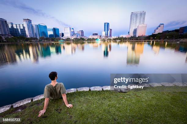 man enjoying the view in orlando - downtown orlando stock pictures, royalty-free photos & images