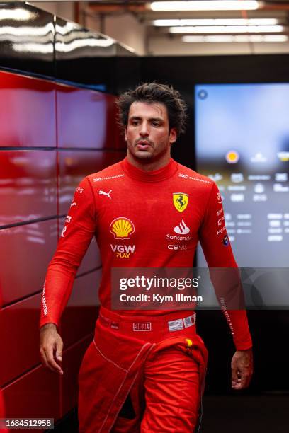 Carlos Sainz of Spain and Ferrari exits the garage during qualifying ahead of the F1 Grand Prix of Singapore at Marina Bay Street Circuit on...