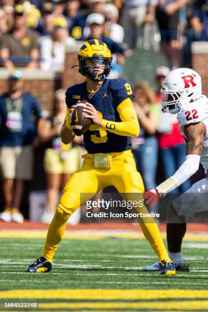 Michigan Wolverines quarterback J.J. McCarthy throws a pass during the college men's football game between the Rutgers Scarlet Knights and the...