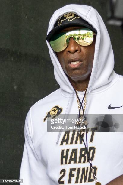Head coach Deion Sanders of the Colorado Buffaloes walks out of the tunnel before their game against the Oregon Ducks at Autzen Stadium on September...