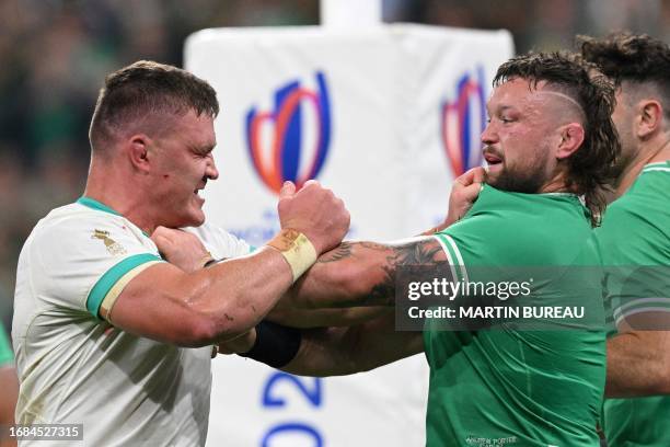 South Africa's flanker Jasper Wiese argues with Ireland's loosehead prop Andrew Porter during the France 2023 Rugby World Cup Pool B match between...