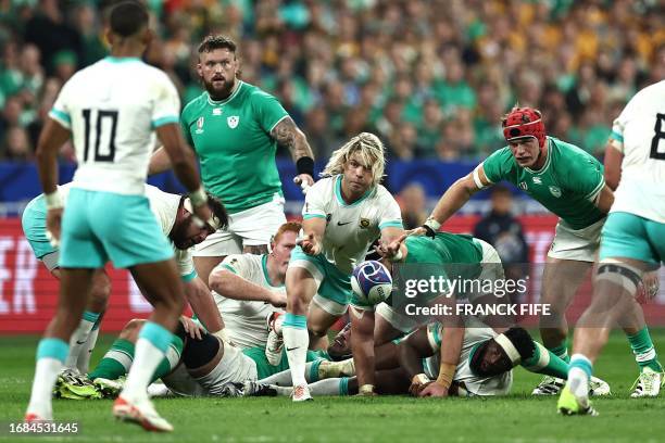 South Africa's scrum-half Faf de Klerk clears the ball out of a ruck during the France 2023 Rugby World Cup Pool B match between South Africa and...