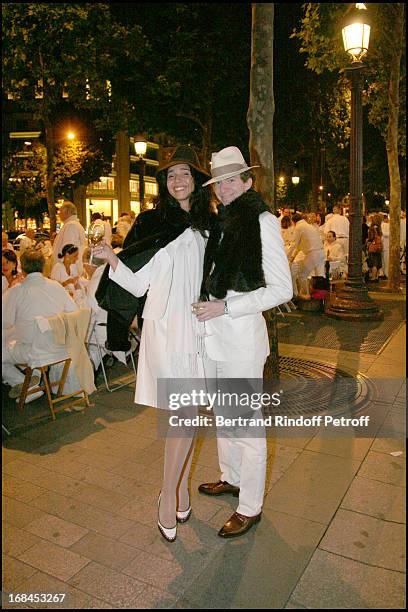 Ludovic Watine Arnault and his fiancee at The Nuit Blanche Event On The Champs Elysees Avenue In Paris.