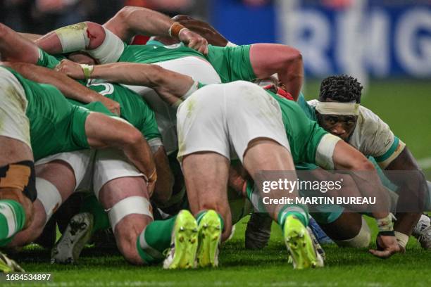 South Africa's blindside flanker Siya Kolisi competes in a scrum during the France 2023 Rugby World Cup Pool B match between South Africa and Ireland...
