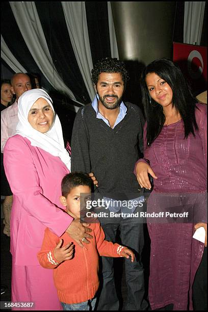 Jamel Debbouze, mother and sister - premiere of the movie "Indigenes" by Rachid Bouchareb at the UGC Normandie on the Champs Elysees in Paris.