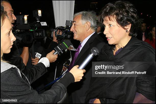 Dominique Strauss Kahn and his wife Anne Sinclair - premiere of the movie "Indigenes" by Rachid Bouchareb at the UGC Normandie on the Champs Elysees...