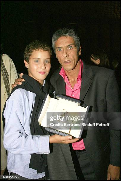 Here with son Julian - Samy Naceri receives the award of performance won at the Cannes Festival 2006 - premiere of the movie "Indigenes" by Rachid...