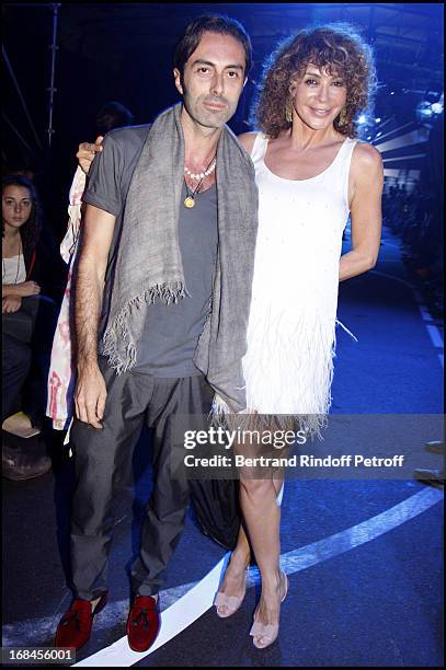 Lady Giannina Faccio, the wife of Sir Ridley Scott, and Giambattista Valli at John Galliano Men Spring Summer 2009 Fashion Show.