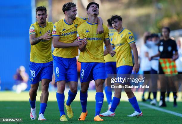 Bernardo Vital of GD Estoril Praia celebrates with teammates after scoring a goal during the Liga Portugal Betclic match between GD Estoril Praia and...