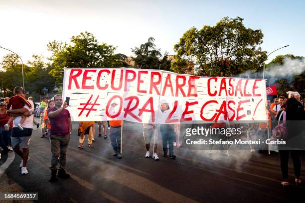 People take part in a demonstration of the movement for the right to housing, at the Garbatella neighborhood, for the regeneration project of Casale...