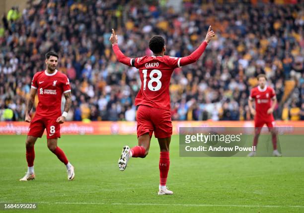 Cody Gakpo of Liverpool celebrates after scoring the equalising goal during the Premier League match between Wolverhampton Wanderers and Liverpool FC...