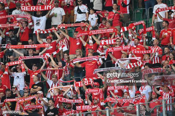 Union Berlin fans show their support prior to during the Bundesliga match between VfL Wolfsburg and 1. FC Union Berlin at Volkswagen Arena on...