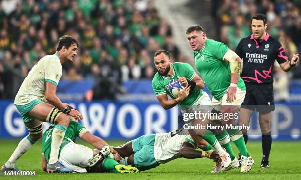 Paris , France - 23 September 2023; Jamison Gibson-Park of Ireland is tackled by Siya Kolisi of South Africa during the 2023 Rugby World Cup Pool B...