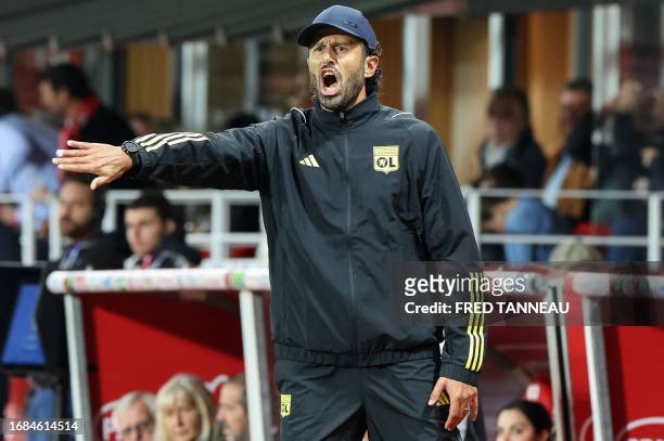Lyon's French head coach Fabio Grosso gestures during the French L1 football match between Brest and Lyon at the Francis Le Ble stadium in Brest,...