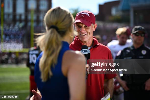Oklahoma head coach Brent Venables being interviewed by Fox Sports reporter Jenny Taft following a college football game between the Oklahoma Sooners...