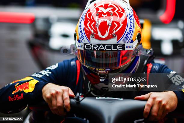 Max Verstappen of the Netherlands and Oracle Red Bull Racing prepares to drive in the garage prior to qualifying ahead of the F1 Grand Prix of...