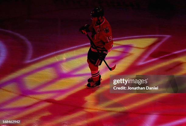 Jonathan Toews of the Chicago Blackhawks skates onto the ice during player introductions before taking on the Minnesota Wild in Game Five of the...