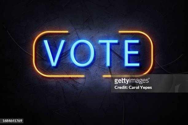 vote in neon style - referendum stock pictures, royalty-free photos & images