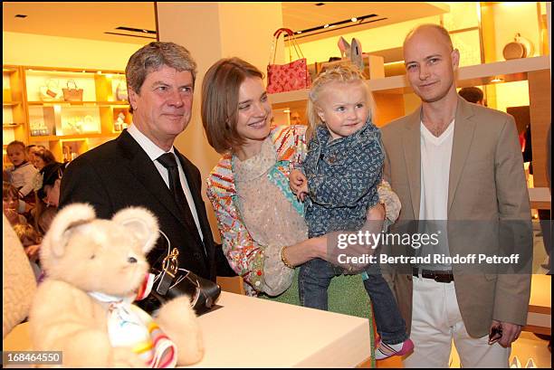 Yves Carcelle and Natalia Vodianova with husband Lord Justin Portman and daughter Neva at The Re-opening Of Louis Vuitton Store In Moscow In...