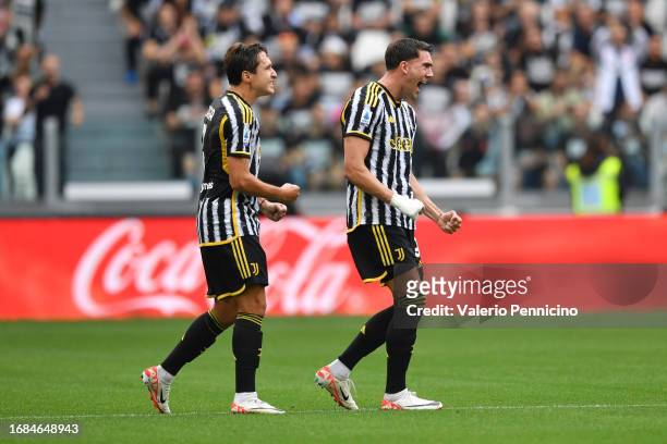 Dusan Vlahovic of Juventus celebrates with Federico Chiesa of Juventus after scoring the team's first goal during the Serie A TIM match between...