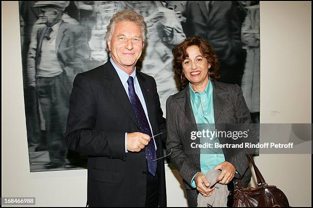 Robert Namias and Anne Barrere in front of the work of Gerhard Richter at Private Viewing Of The Exhibition "Where Are We Going?" In Venice.