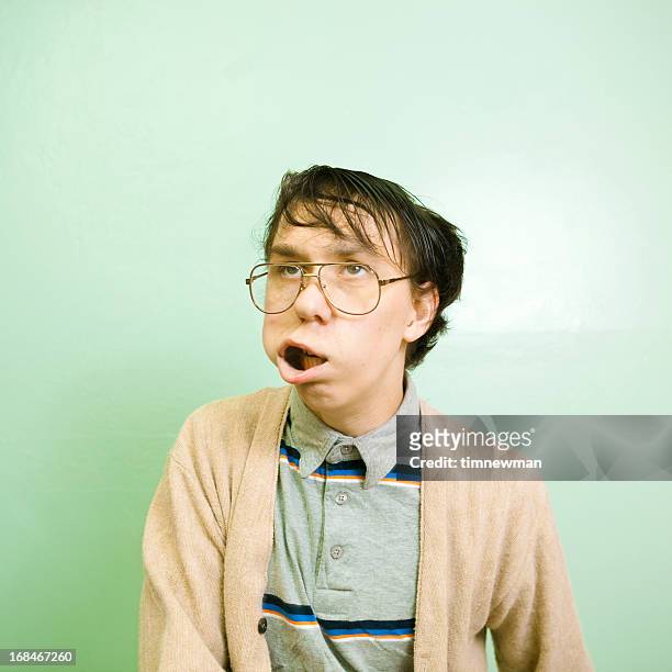 nerdy dude with wild facial expression - ugly face 個照片及圖片檔