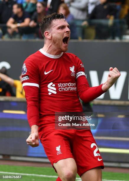 Andrew Robertson of Liverpool celebrates scoring their 2nd goal during the Premier League match between Wolverhampton Wanderers and Liverpool FC at...