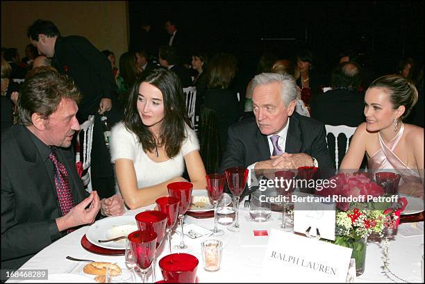 Johnny Hallyday, Diane de Mac Mahon, Philippe Labro and Laeticia Hallyday at Fashion Against AIDS Party In Paris.