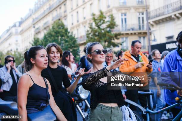 Woman is dancing to electronic music at the techno parade in Paris, France, on September 23, 2023. Approximately 400,000 people are parading through...