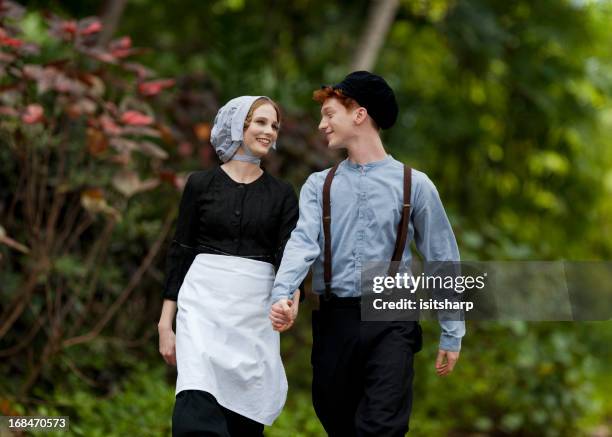 young couple - amish man stock pictures, royalty-free photos & images