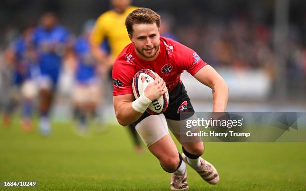 Ruaridh Dawson of Cornish Pirates goes over to score their sides first try during the Premiership Rugby Cup match between Exeter Chiefs and Cornish...