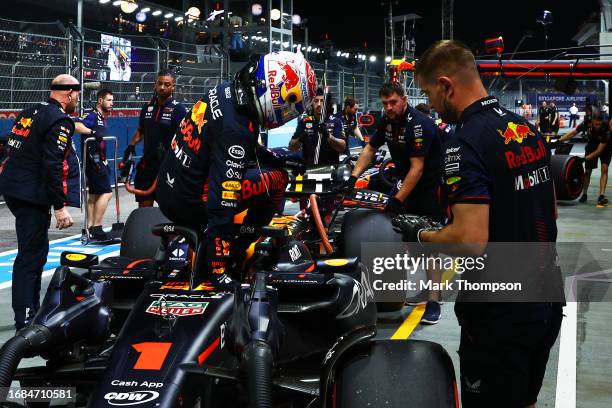 11th placed qualifier Max Verstappen of the Netherlands and Oracle Red Bull Racing climbs from his car in the Pitlane during qualifying ahead of the...