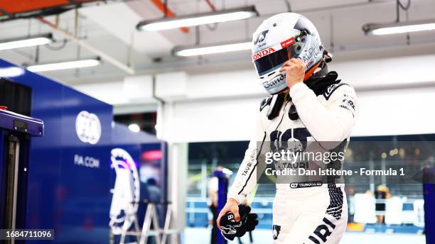 Fifteenth placed qualifier Yuki Tsunoda of Japan and Scuderia AlphaTauri walks into the FIA garage during qualifying ahead of the F1 Grand Prix of...