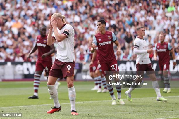 Erling Haaland of Manchester City reacts after missing a chance during the Premier League match between West Ham United and Manchester City at London...