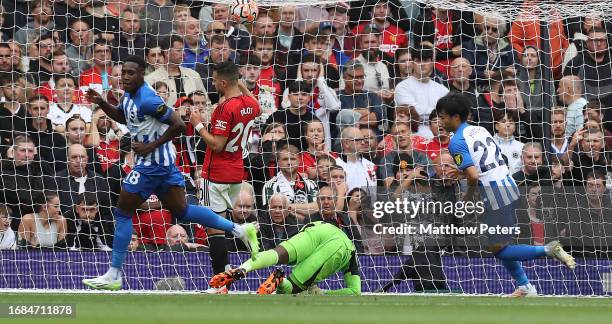 Danny Welbeck of Brighton & Hove Albion celebrates scoring their first goal during the Premier League match between Manchester United and Brighton &...