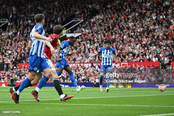 Danny Welbeck of Brighton & Hove Albion scores their sides first goal during the Premier League match between Manchester United and Brighton & Hove...