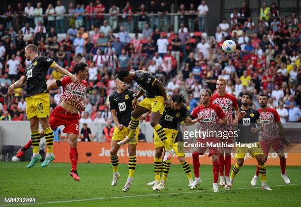 Nicolas Hoefler of Sport-Club Freiburg scores the team's second goal during the Bundesliga match between Sport-Club Freiburg and Borussia Dortmund at...