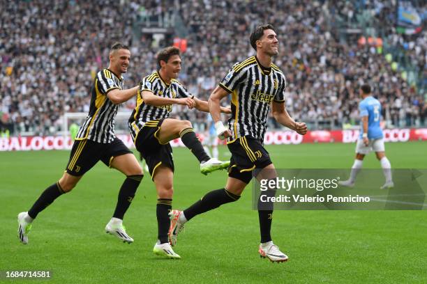 Dusan Vlahovic of Juventus celebrates with teammates after scoring the team's third goal during the Serie A TIM match between Juventus and SS Lazio...