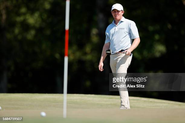 Patrick Cover of the United States reacts after missing a putt for birdie on the ninth green during the first round of the Simmons Bank Open for the...